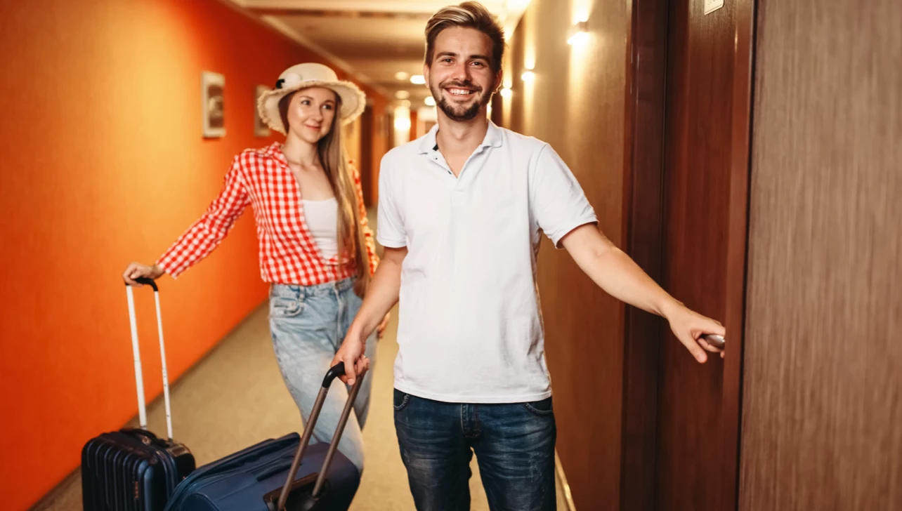 Deaf person communicating at hotel reception