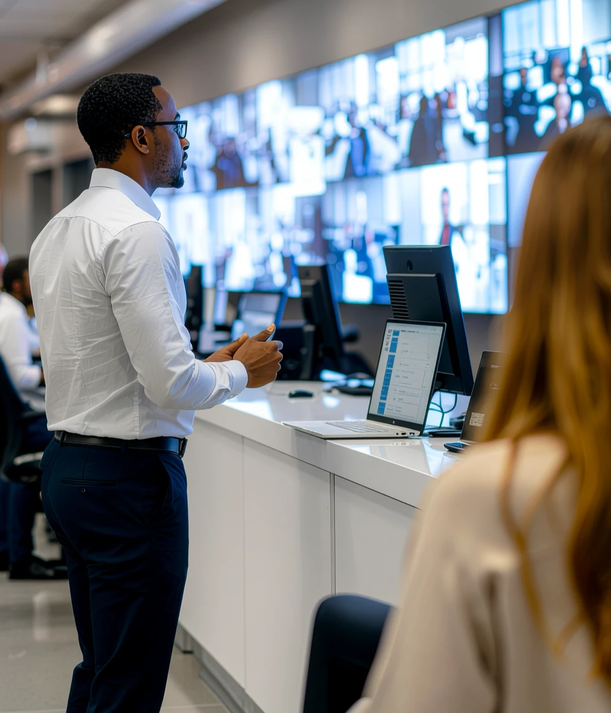 A person watching a live screen for important updates